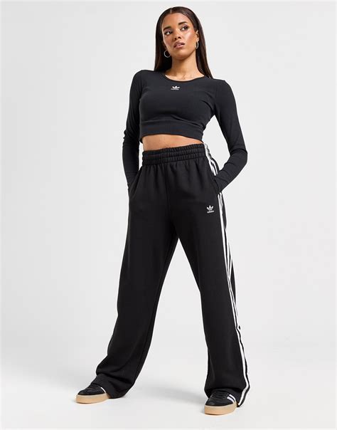 svarta adidas byxor dam